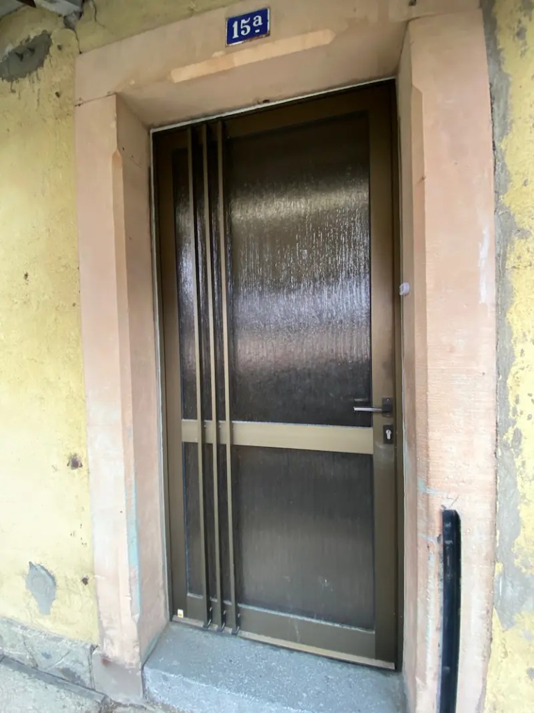 Ancienne porte d'entrée vitrée en aluminium